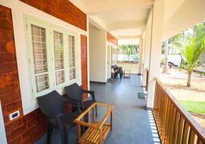 Posezení v ubytování Ocean View Beach Villa Varkala by VOYE HOMES