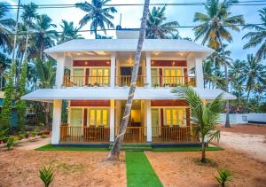 Zahrada ubytování Ocean View Beach Villa Varkala by VOYE HOMES