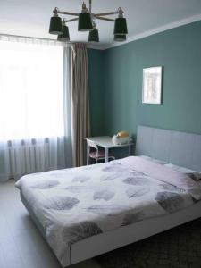 Ένα ή περισσότερα κρεβάτια σε δωμάτιο στο Comfy apartment in the heart of Ulaanbaatar