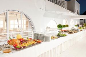 a buffet line with many plates of food at Hotel Sporting in Casalbordino