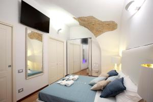 A bed or beds in a room at Stella Maris suite relax