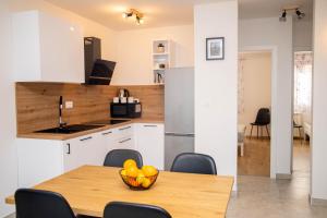 Kuchyň nebo kuchyňský kout v ubytování Apartment Fioretti