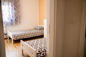 Postel nebo postele na pokoji v ubytování Apartment Fioretti
