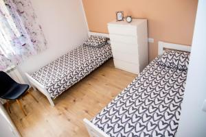 Postel nebo postele na pokoji v ubytování Apartment Fioretti