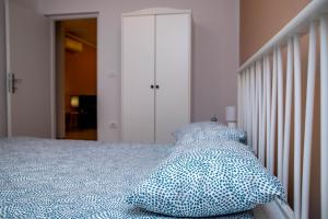 Postel nebo postele na pokoji v ubytování Apartment Fioretti