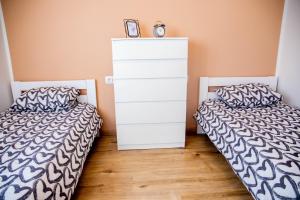 Postel nebo postele na pokoji v ubytování Apartment Fioretti