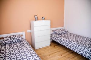 Postel nebo postele na pokoji v ubytování Apartment Fioretti