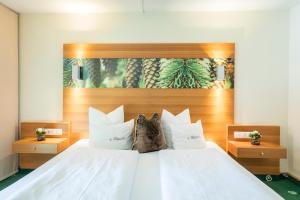 Postel nebo postele na pokoji v ubytování Hotel Sonnblick