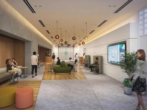 a lobby with people sitting in chairs and tables at Prince Smart Inn Osaka Yodoyabashi in Osaka