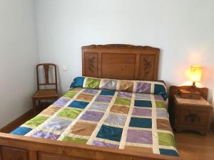 Postel nebo postele na pokoji v ubytování Le petit ru