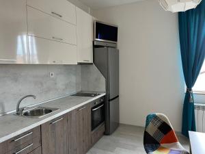 A kitchen or kitchenette at Vitosha 60