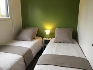 Postel nebo postele na pokoji v ubytování Pistache la vallee des noyers