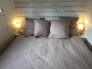 Postel nebo postele na pokoji v ubytování Quinoa la vallee des noyers