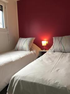Postel nebo postele na pokoji v ubytování Framboise la vallee des noyers