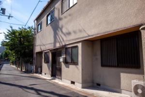 a shadow of a building on the side of a street at Heights MR2 - Vacation STAY 88275 in Nara