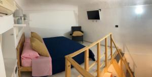 Ένα ή περισσότερα κρεβάτια σε δωμάτιο στο Monolocale Porta Napoli