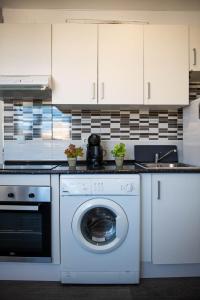 Kuchnia lub aneks kuchenny w obiekcie Casa Zoe - Apartamentos en Suite Budha - Buenas vibras! Edificio #LasNaciones