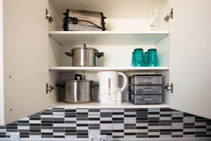 Kuchnia lub aneks kuchenny w obiekcie Casa Zoe - Apartamentos en Suite Budha - Buenas vibras! Edificio #LasNaciones