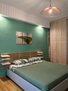 A bed or beds in a room at 1 BedRoom Apt - Live Like A Local In Kolonaki