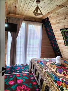 Postel nebo postele na pokoji v ubytování A frame Sima