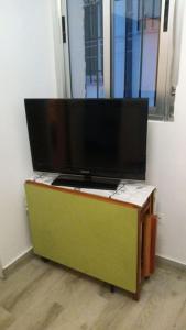En tv och/eller ett underhållningssystem på Apartamento Alicia