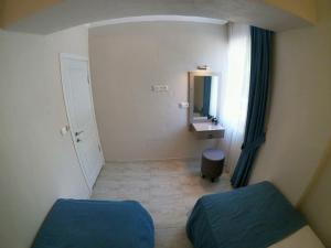 Postel nebo postele na pokoji v ubytování MirAlya Homes
