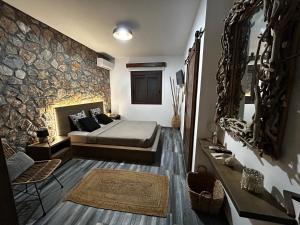 Postel nebo postele na pokoji v ubytování Aithonas Villa
