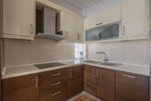 Köök või kööginurk majutusasutuses Classic & Modern Family Apartment