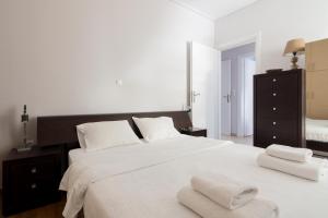 Una cama o camas en una habitación de Classic & Modern Family Apartment