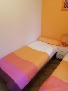 Postel nebo postele na pokoji v ubytování Lanteuil Maison de vacances à côté de brive et collonge la rouge + 22 fotografií