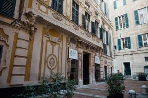 a building with a clock on the side of it at Rolli Dream in Genova