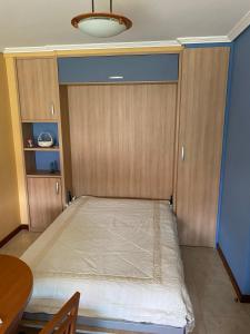 Ein Bett oder Betten in einem Zimmer der Unterkunft APARTAMENTO LADEIRA PLAYA