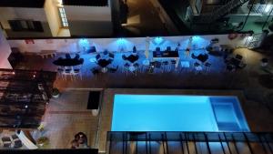 Bazén v ubytování Hotel Raxa nebo v jeho okolí