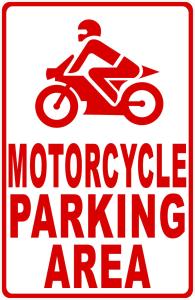 um sinal para uma área de estacionamento de motas com uma pessoa a andar de mota em Cortile dei Mori em Palermo