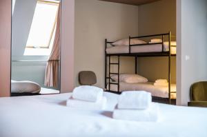 Postel nebo postele na pokoji v ubytování Hotel Halbert