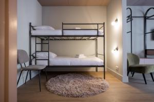 Postel nebo postele na pokoji v ubytování Hotel Halbert