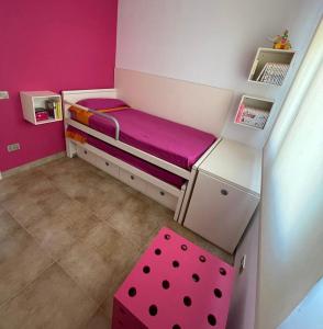 Postel nebo postele na pokoji v ubytování FRENTE AL MAR