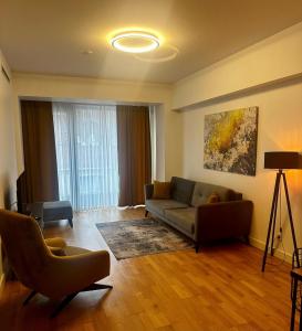 Ein Sitzbereich in der Unterkunft The Y Istanbul Suites