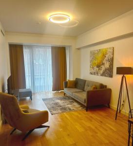 Ein Sitzbereich in der Unterkunft The Y Istanbul Suites