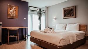 Postel nebo postele na pokoji v ubytování Letana Hotel