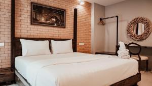 Postel nebo postele na pokoji v ubytování Letana Hotel