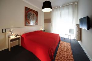 Residence Pian della Nave tesisinde bir odada yatak veya yataklar