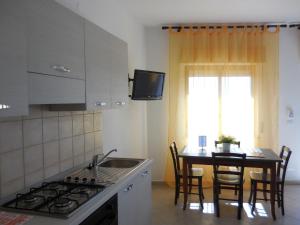 Kuchyň nebo kuchyňský kout v ubytování Case Vacanze Farchikalà