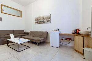 Posezení v ubytování Deluxe Suites