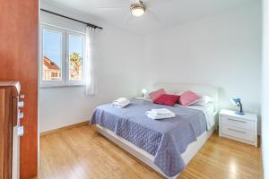 Postel nebo postele na pokoji v ubytování Villa Trebotić