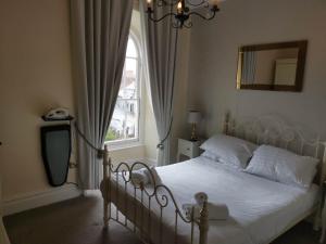 Postel nebo postele na pokoji v ubytování Llety Teifi Guest House