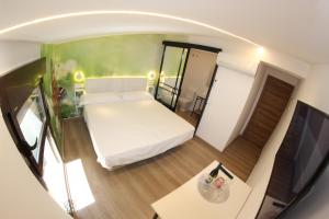 Postel nebo postele na pokoji v ubytování FP HOTELs