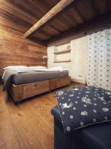 Postel nebo postele na pokoji v ubytování AMELU' LOCAZIONI TURISTICHE + 7 fotografií