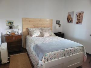 Кровать или кровати в номере Estoril Beach Apartment