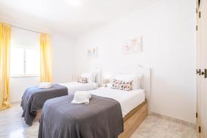 Postel nebo postele na pokoji v ubytování Frente ao Mar - 3 quartos - wi-fi - AQ